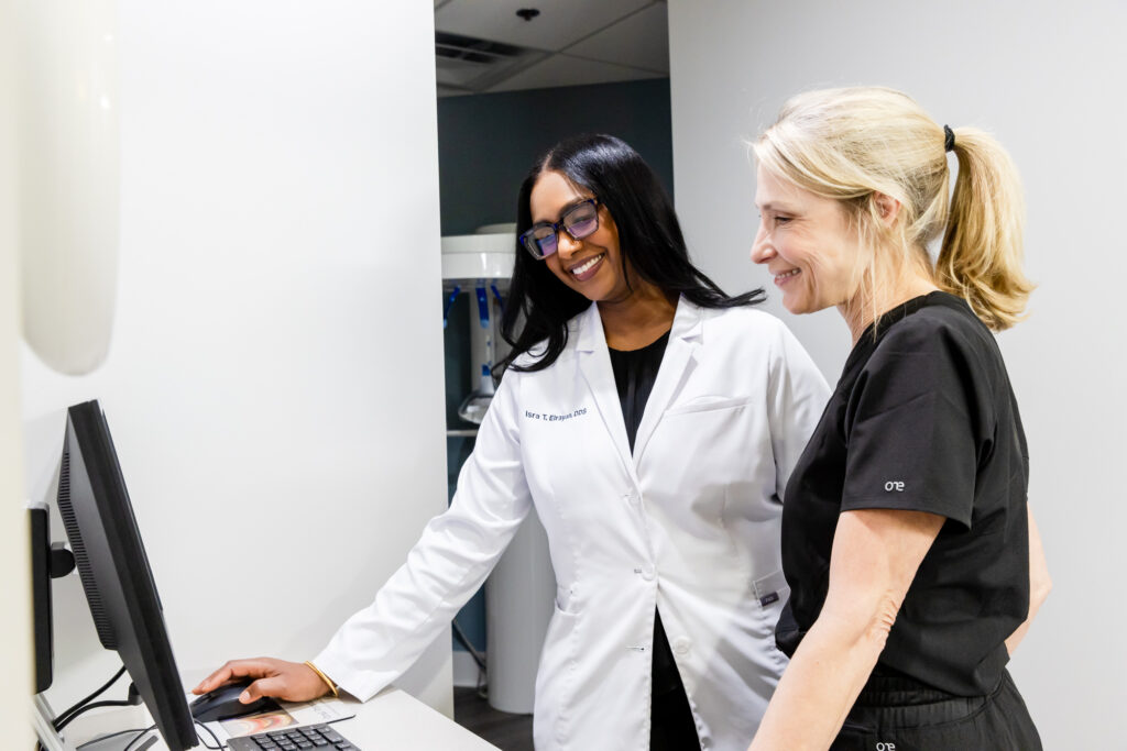 Our dentist in Fairfax looking at a patients digital impressions